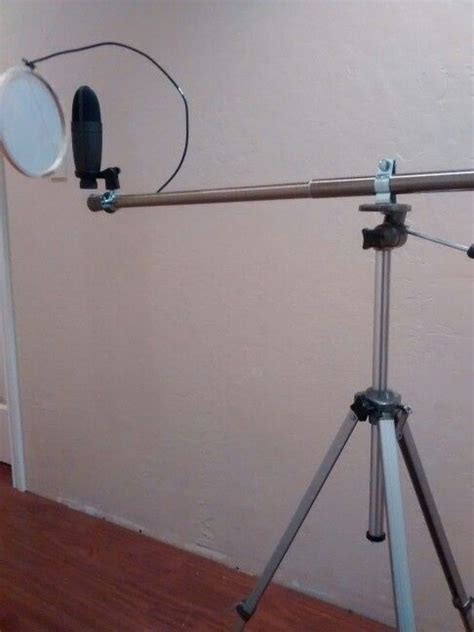 By using metal table one can reduce noise due to vibrations. DIY mic stand. Camera tripod with a #1 conduit hanger attaching a shower curtain rod. On the end ...