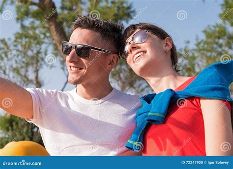 Two Friends Relaxing On The Bench After A Stroll Stock Photo Image Of