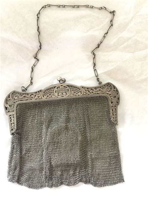 The metal mesh boxes are loaded with desirable features that increase convenience. 1900's Sterling Chain Mesh Handbag Including Small Coin ...