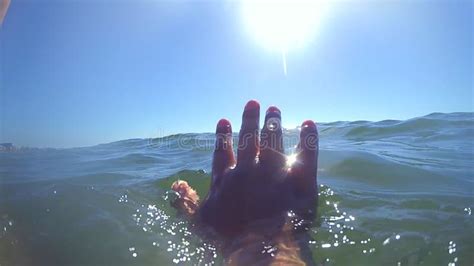 Slow Motion Pov The Hand Of The Man Who Sinks The Hand Rises And Falls Stock Video Video Of