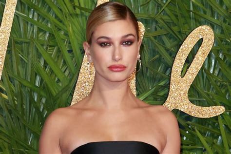 hailey baldwin had a wardrobe malfunction in a very short cocktail dress and 6 5 inch heels