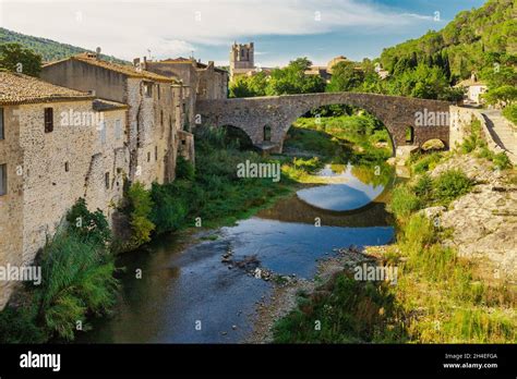 Lagrasse Village With The Old Bridge And The Roman Abbey Of Saint Mary