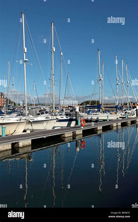White Yachts With Tall Masts In Weymouth Harbour Home To The 2010