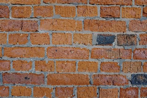 Old Shabby Brick Wall Of Building On Street · Free Stock Photo