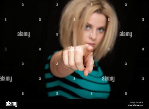 Blonde Woman Pointing Stock Photo Alamy