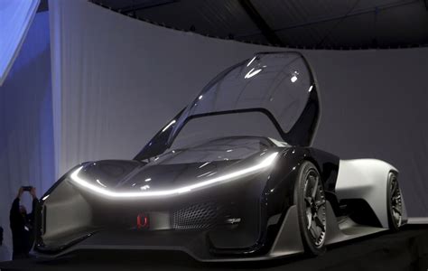Ces 2016 Faraday Future Unveils Futuristic Electric Racecar Cbc News