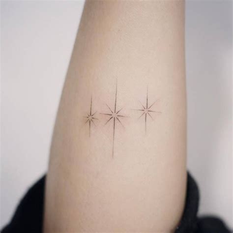 Small Tattoos — Fine Line Style Stars On The Forearm Tattoo Star