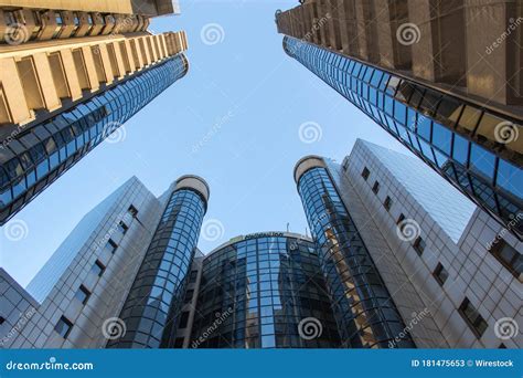 Low Angle Shot Of High Rise Buildings Under A Clear Blue Sky Editorial