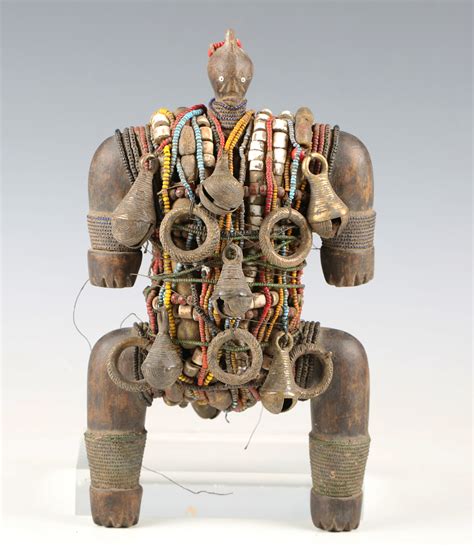 An African Carved Hardwood Namji Fertility Doll Cameroon Covered In Applied Beads Brass Bells And