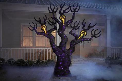 Up Your Halloween Game This Year With An 8ft Spooky Light Up Ghost Tree