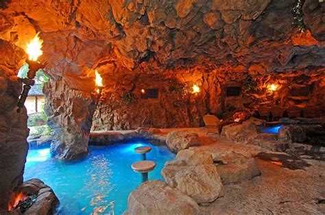 A Luxurious Pool With A Waterfall And A Cave At Old Lion Manor