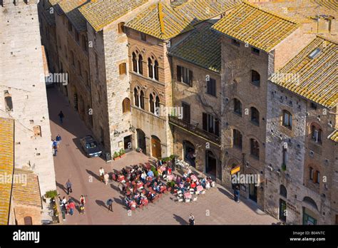 piazza della cisterna seen from torre grossa in the historic old town centre of san gimignano