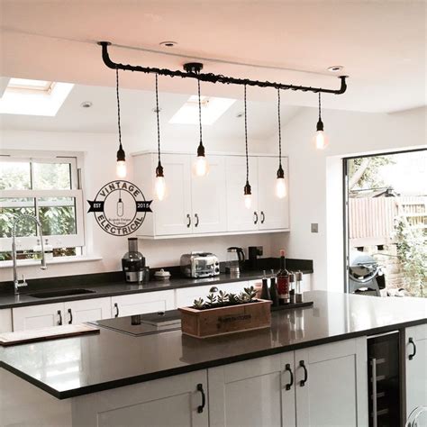 It can be suspended or flush mounted to mold to the difficult ceiling shape, and the easy adjustability makes it ideal for lighting up the dim corners that often come with high ceilings. Brushed Nickel Kitchen Track Lighting | Retro kitchen ...