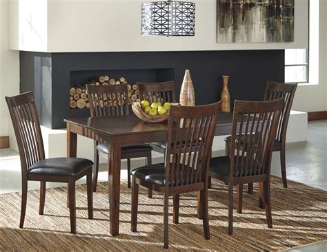 Each dining room set features adjustable tables and chairs that grow with your family and last for generations to come. Mallenton Medium Brown 7 Piece Dining Room Set from Ashley ...