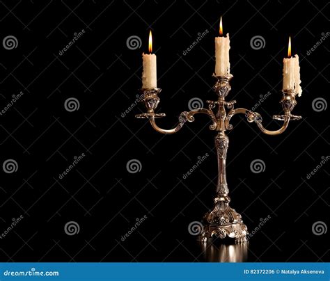 Burning Old Candle Vintage Silver Bronze Candlestick Isolated Black