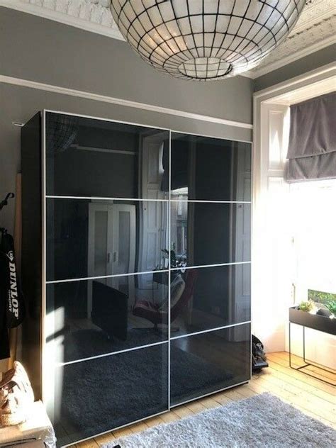 2 x hanging space 2 x jewellery/accessory drawers 10 x drawers 2 x shelves the wardrobe is three years old, with slight wear (not visible). Large Ikea PAX Wardrobe with sliding doors (Black) | in ...