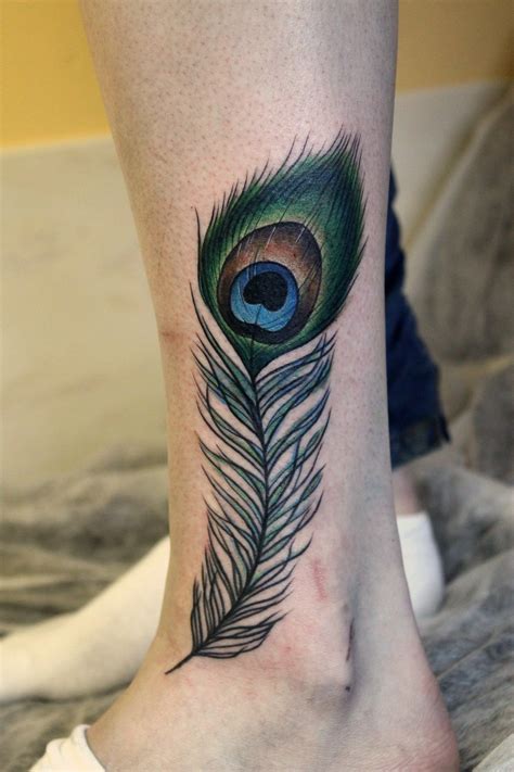 Peacock Feather Tattoo 17 Unique Designs And Meanings Peacock Tattoo