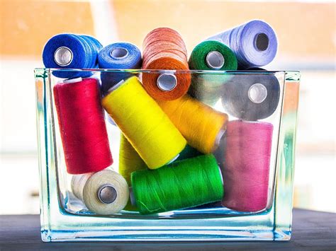 Hd Wallpaper Assorted Color Thread Lot On White Surface Yarn Spools