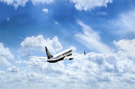 Jet Plane In A Blue Cloudy Sky Free Stock Photo Public Domain Pictures