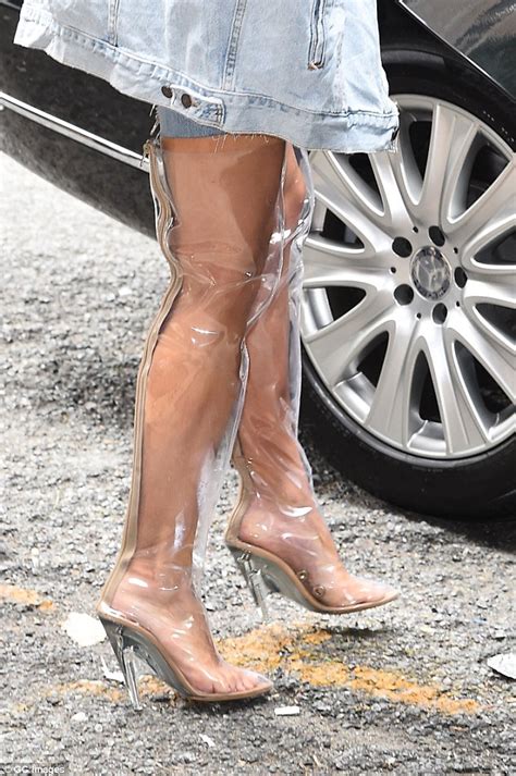 Kim Kardashian Debuts Thigh High Plastic Boot That Puts Her Toned Legs