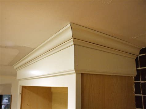 Mark where the crown molding will sit on the cabinet use a straight edge (such as a long level) to mark where the crown molding will sit on the cabinet facing. How to Install Cabinet Crown Molding | how-tos | DIY