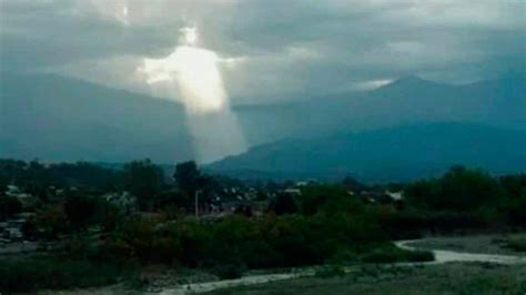 image of jesus shining through the clouds goes viral fox news