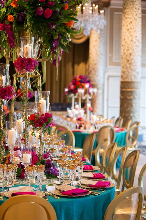 A Breathtaking Teal And Gold Themed Table Decor Gorgeous Pink Rosettes
