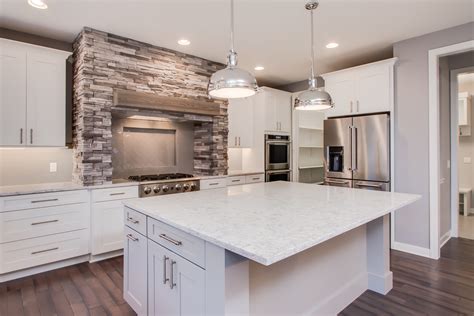 Kitchen cabinet designs customized for you. Kitchen: Pecan hardwood floors, quartz countertops ...
