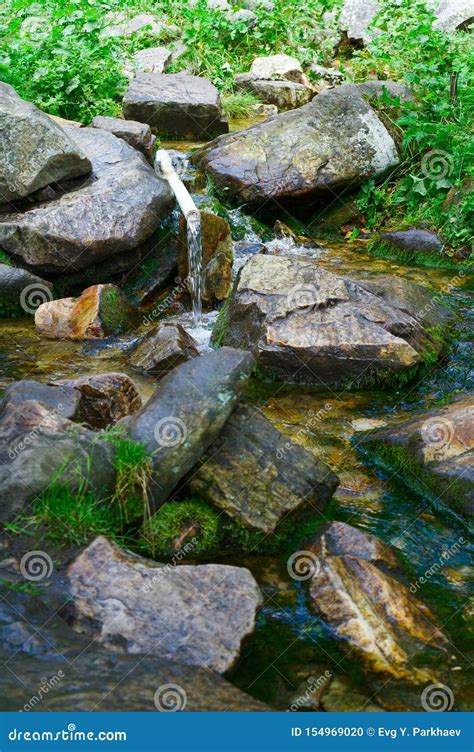 White Spring Mountain Drinking Water Source Taganay Stock Photo