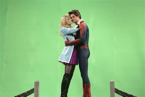 Emma Stone Helps Andrew Garfield With Snl Monologue The Amazing Spider Man 2 Kiss Spoofed