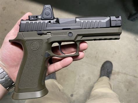 New Era Of Compensated Pistols The Pmm P320 Compensator The Firearm