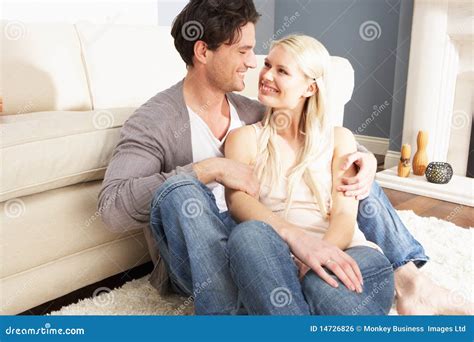 Romantic Young Couple Relaxing Together At Home Stock Photo Image Of