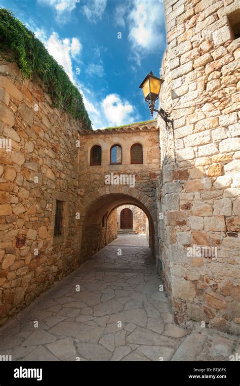 Old Narrow Passageway In Medieval Town Of Peratallada Spain Stock