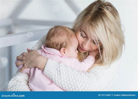 Mother Puts Her Baby Daughter To Sleep Stock Image Image Of