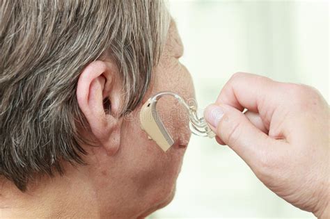 Closeup Senior Woman Using Hearing Aid Stock Image Image Of Aids Device 96718201