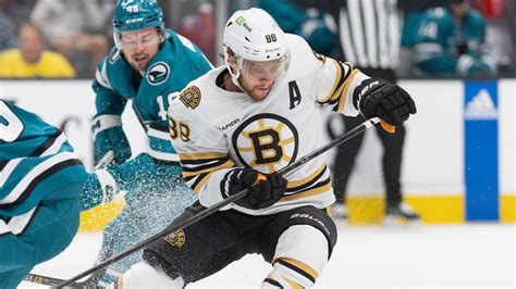 Watch David Pastrnak Score Bizarre Goal While Being Tripped Vs Sharks