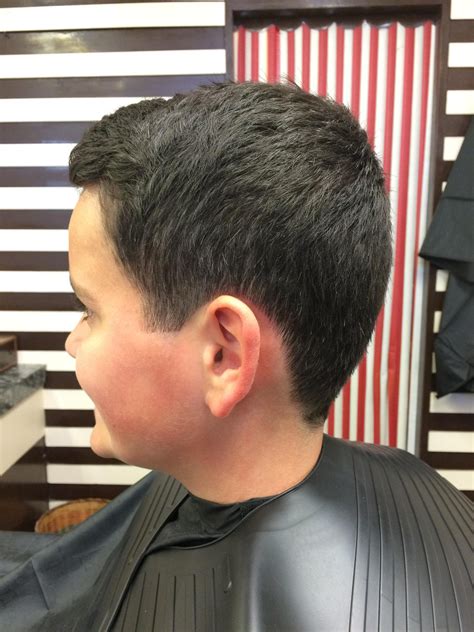It's a men's haircut that features very short, thin, or shaved sides and lower back of the hair accompanied by a longer top. Ian James Barber on Twitter: "Boy cut,short back and sides ...