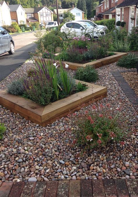 Raised Borders In A Front Garden Create Controlled Planting Low