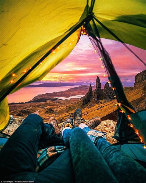 The Couple Sharing A Romantic Moment As They Lie Together In A Tent In Scotland Camping