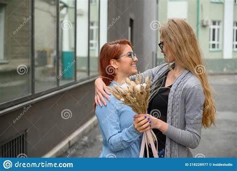 same sex relationships happy lesbian couple with dried flowers stock image image of affection