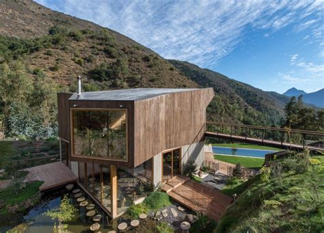 Casa El Maqui In Chile Is Surrounded By Flooded Gardens That Help Cool