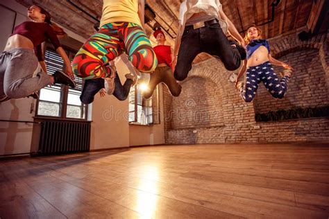 Modern Dancing Group Practice Dancing In Jump Stock Photo Image Of