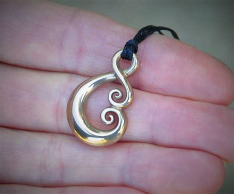 Solid Bronze Pendant~ Maori Love Symbol Felt