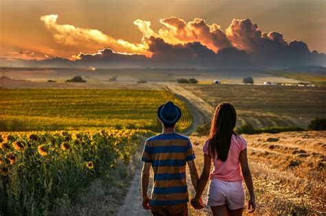 Couple Holding Hands Road Field Back Clouds Sunflowers Wallpapers