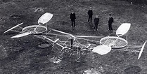 French engineer Paul Cornu in his first helicopter in 1907. Note that ...