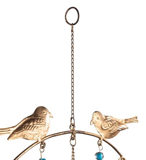 Golden Colored Metal Birds And Bird Houses Wind Chime Wind And Weather