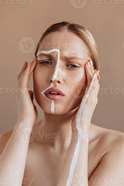 Blonde Woman Has Headache And Massages Her Head Shot Of Lady With