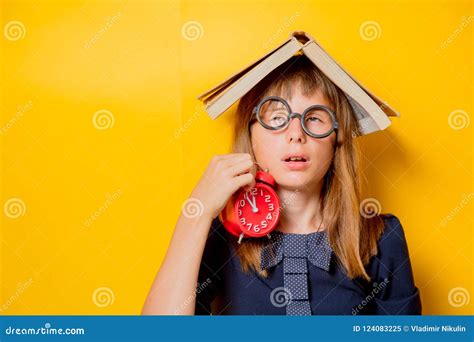 Nerd Girl In Glasses With Books And Alarm Clock Stock Image Image Of