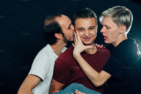 three guys are gay on dark backgroun high quality people images ~ creative market