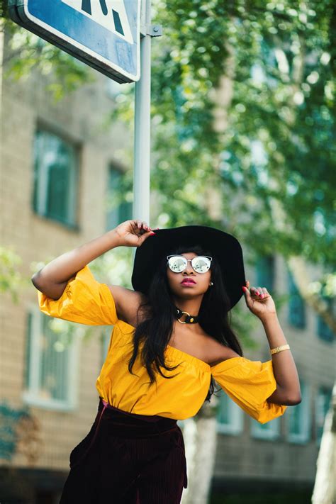 Download Black Woman Vibrant Summer Look Wallpaper
